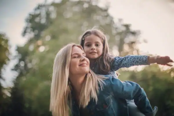 happy mum and daughter following mediation to resolve parental alienation Eastbourne